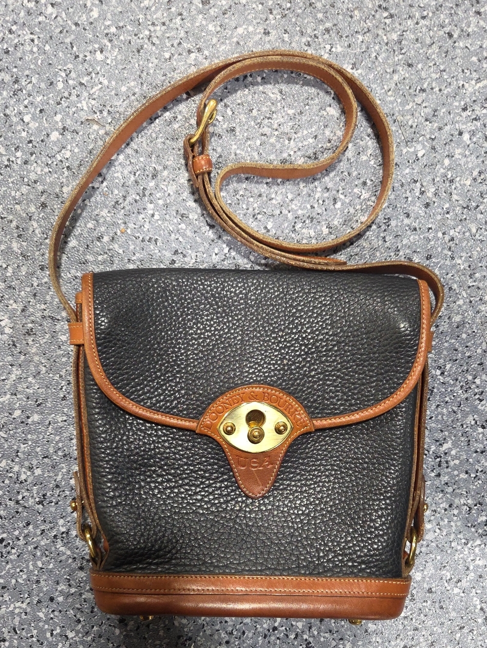 Dooney & Bourke Black and Brown Pebbled Leather Crossbody with Gold Hardware